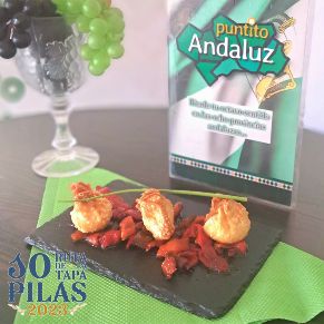 Puntito Andaluz - Bombón crujiente de caldereta a la salsa de toro sobre cama de pimiento rojo caramelizado ok